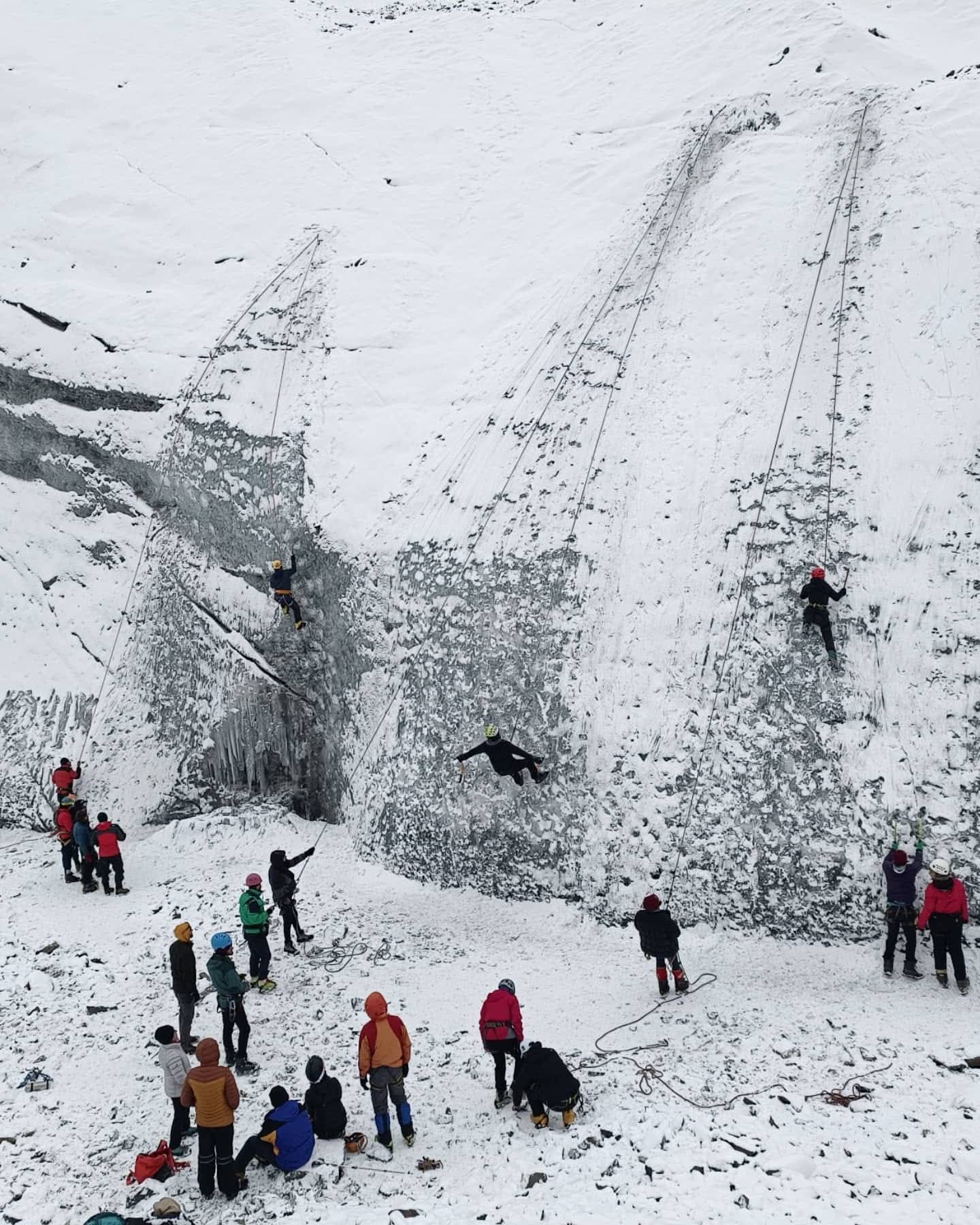KMGA training — guides on snowfield during technical training session